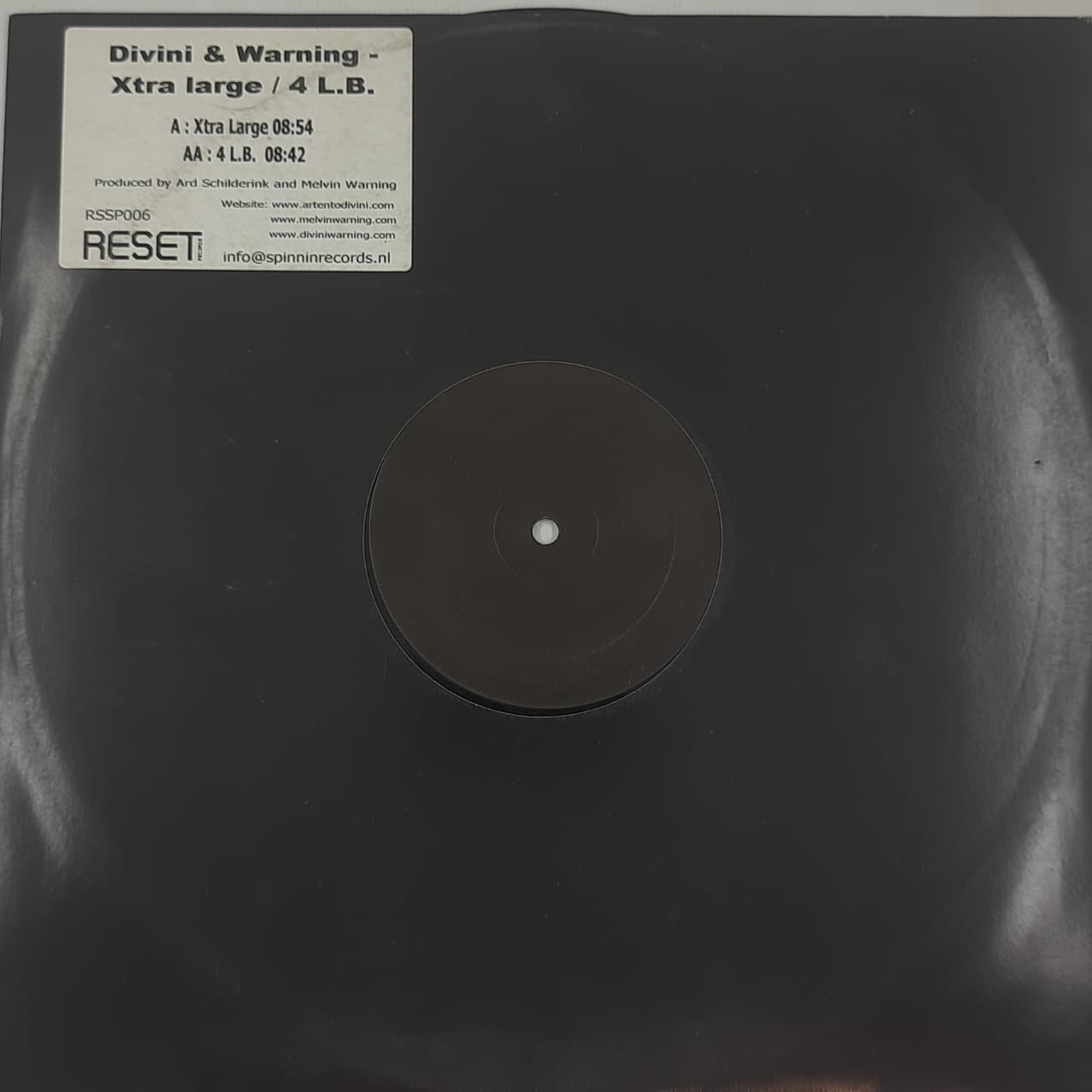 Divini &amp; Warning – Xtra Large / 4 L.B. (VINYL / USED)